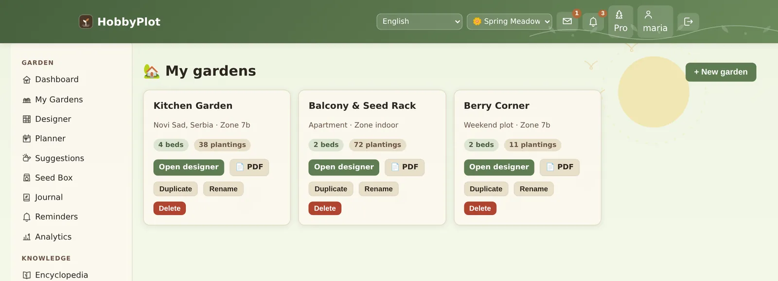 My gardens page listing a kitchen garden, a balcony and seed rack, and a berry corner with bed and planting counts